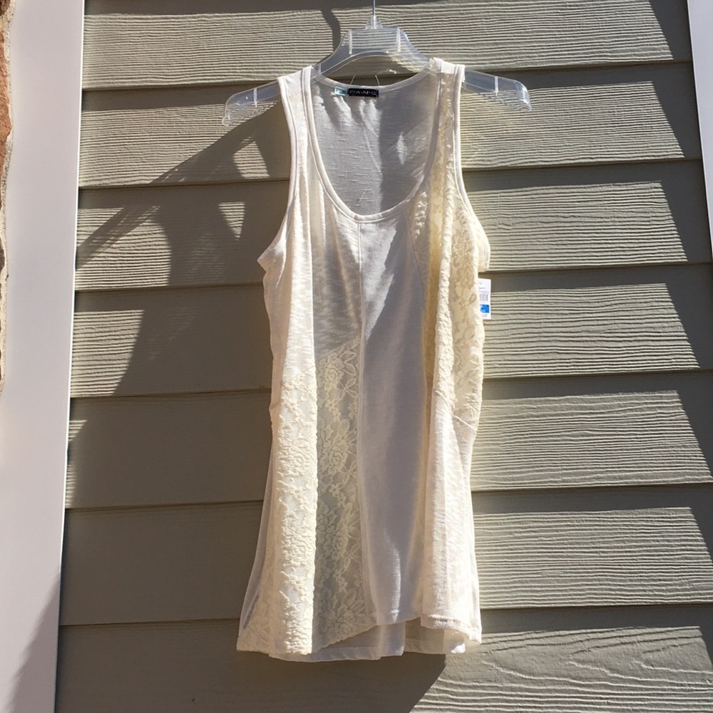 Top sleeveless great for over shorts or beach